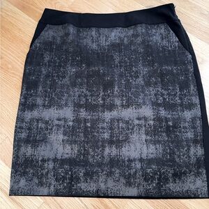 Eileen Fisher straight skirt with a silver and black front panel.
